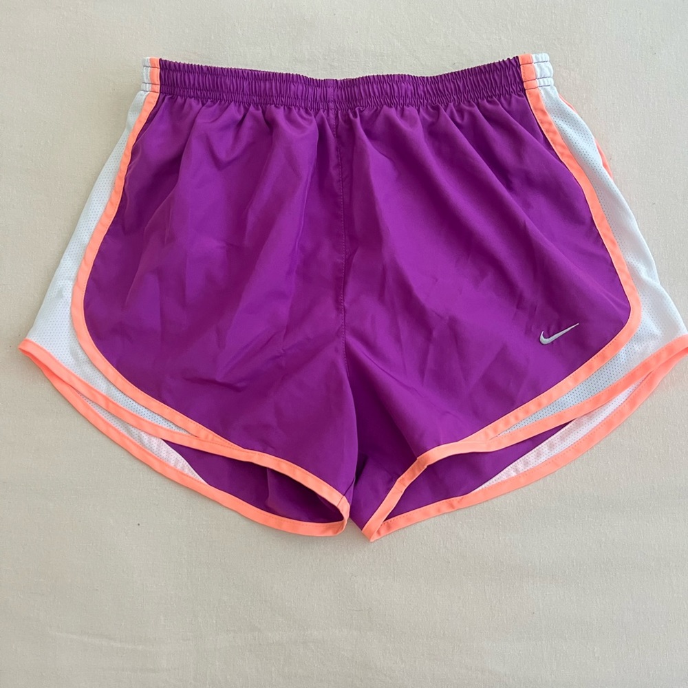 Purple Nike athletic shorts with lining. Size M.